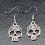 Aretes Calavera Plana en Acero