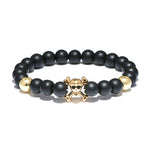 Brazalete Calavera Oro y Huesos Cruzados