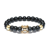 Brazalete Calavera Oro y Huesos Cruzados